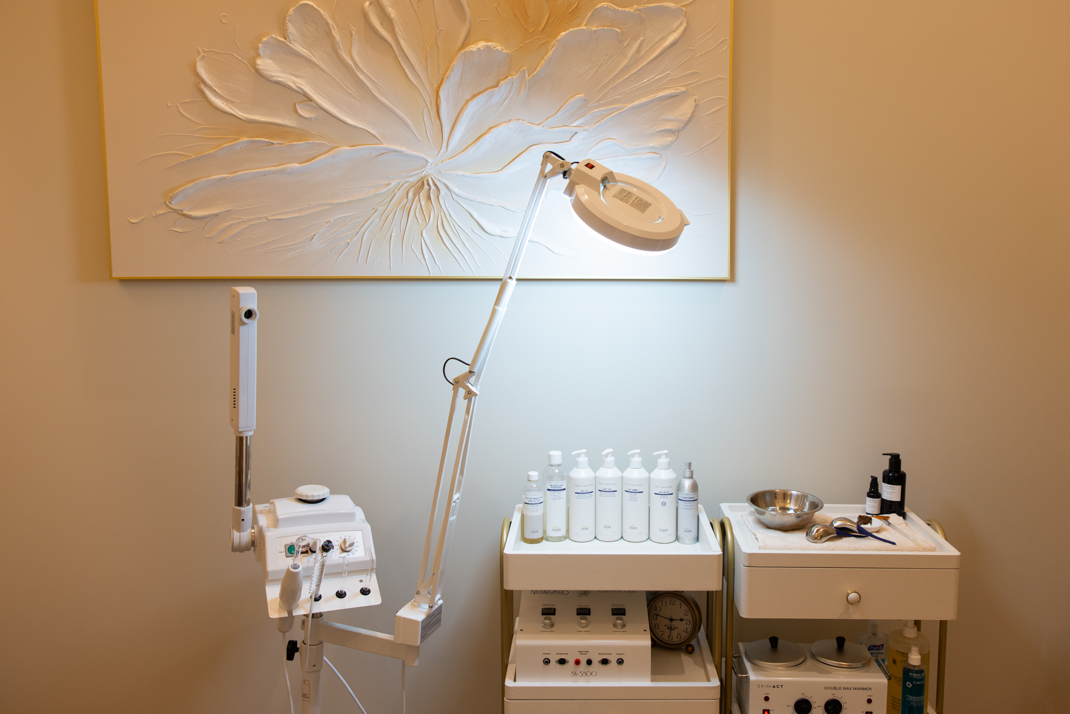 Treatment room with professional skincare equipment at Iconic Skin