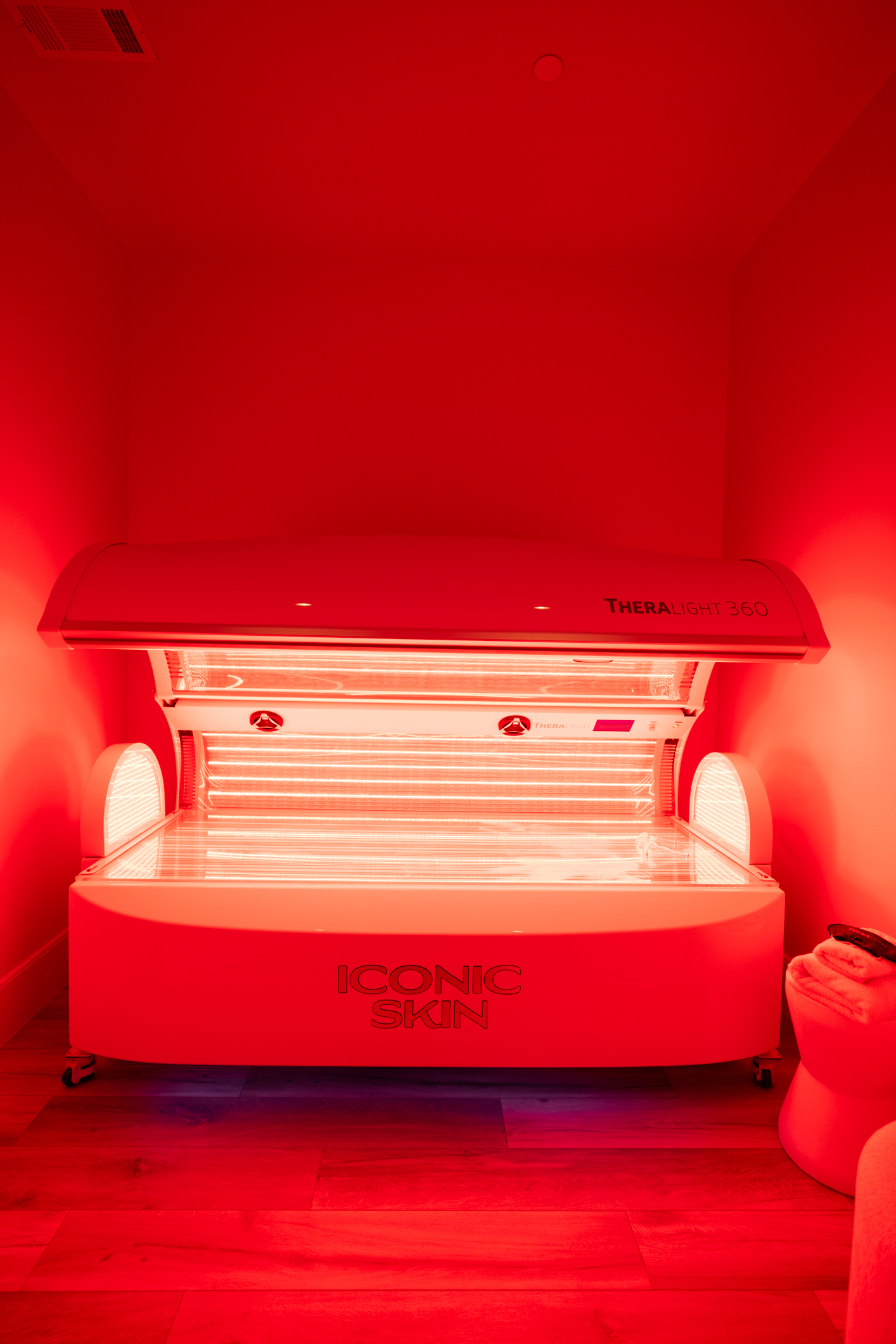 TheraLight 360i full-body red light therapy pod at Iconic Skin in Salt Lake City