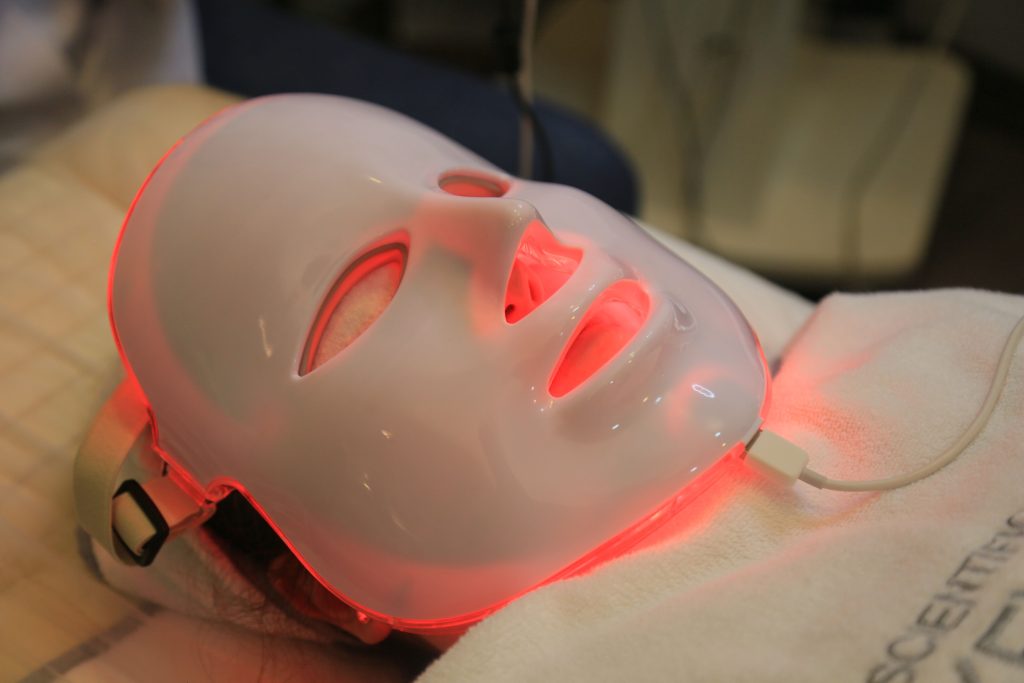 Red light therapy LED panel setup used at Iconic Skin Boutique